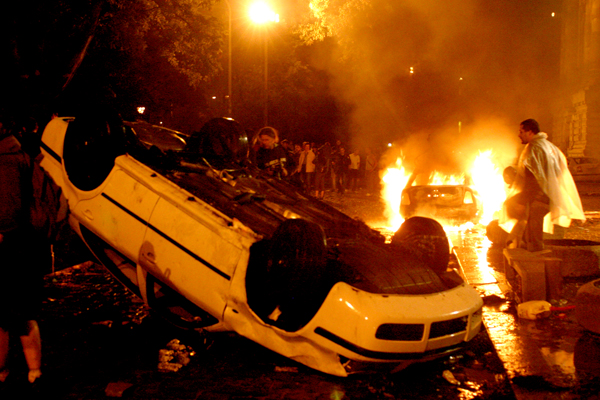 Hungarian Riots 2006 a car upside down